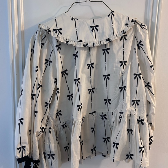 Ruffled Bow-Print Peplum Blouse in Ivory and Black - Picture 6 of 6